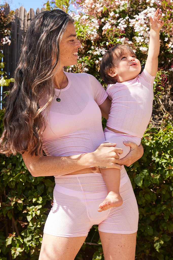 Pink mini tee and short set: round-neck short-sleeve tee with matching ribbed shorts