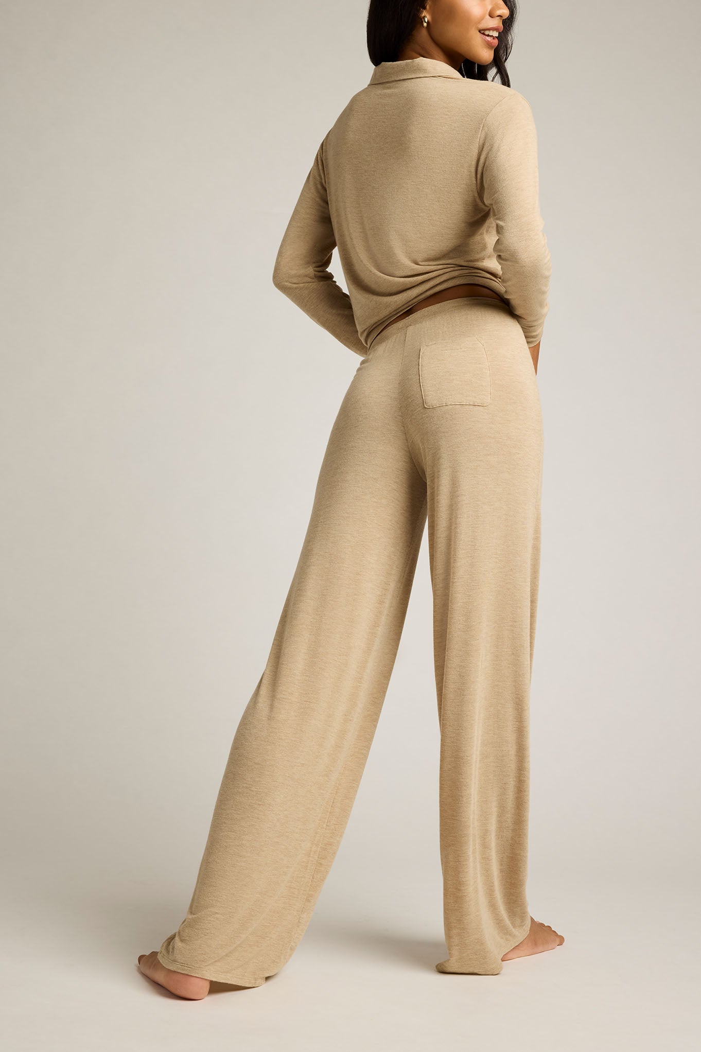Dune cashmere track pants, back view with patch pocket and relaxed wide-leg fit