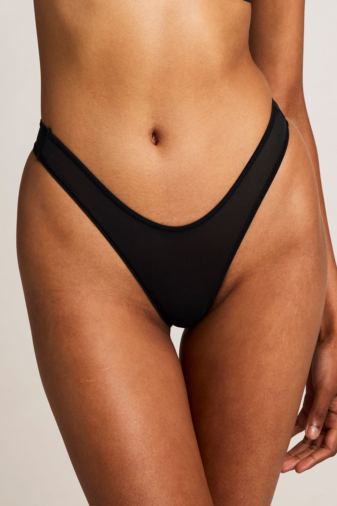 Black high-cut mesh thong with wide side straps